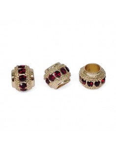 Perla dorata con foro largo con strass rossi 6x7 mm, x 1
