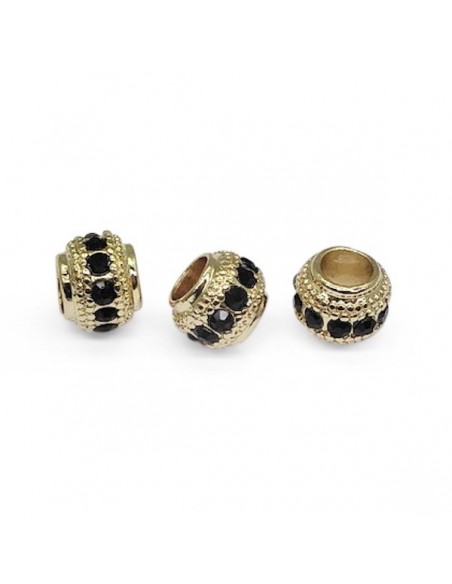 Perla dorata con foro largo con strass neri 6x7 mm, x 1