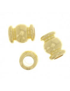 Piccole perline tubolari dorate lavorate 6x5 mm, x 6