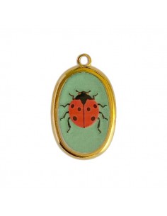 Charm medaglietta dorato ovale sfondo verde con...
